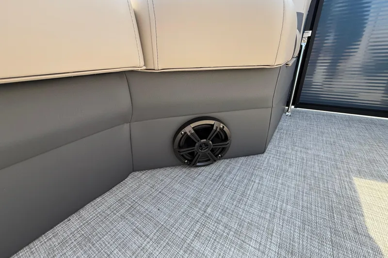 Slide: The Image of 2025 Flagship E22RF Sport Toon interior with speaker and cushioned seating. - 48