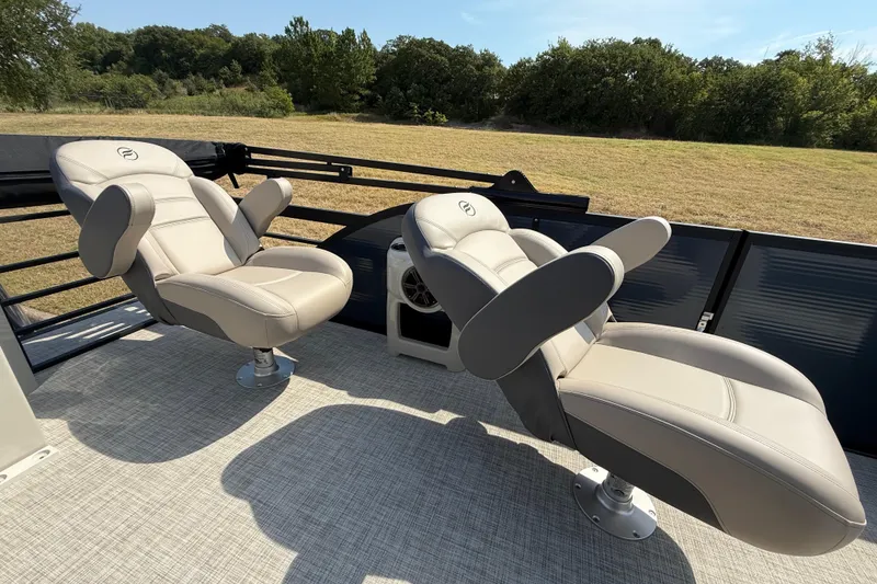 Slide: The Image of Luxurious seating on 2025 Flagship E22RF Sport Toon boat, featuring plush, adjustable chairs. - 60