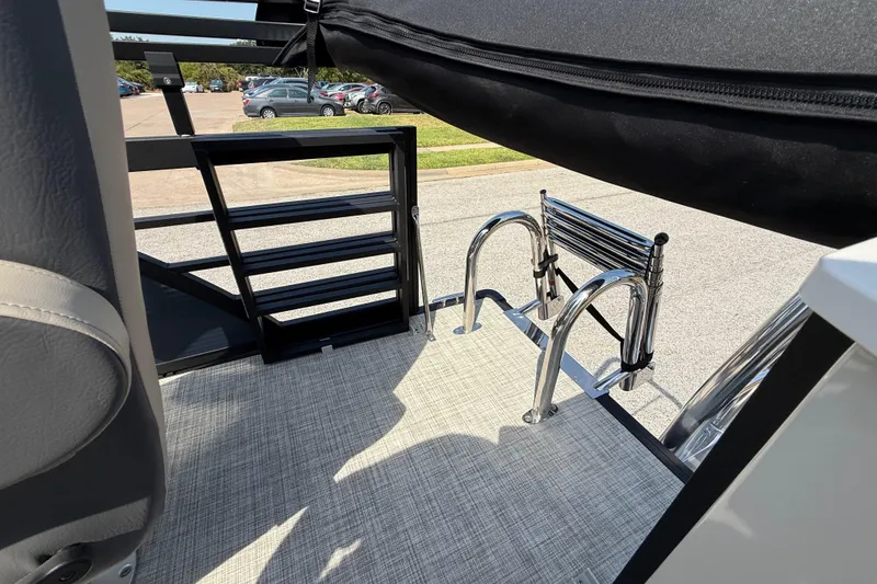 Slide: The Image of 2025 Flagship E22RF Sport Toon boat with sleek ladder and modern design. - 69