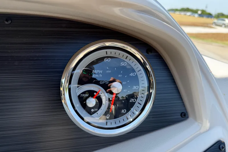 Slide: The Image of Speedometer of 2025 Flagship E22RF Sport Toon, displaying MPH and trim settings. - 79