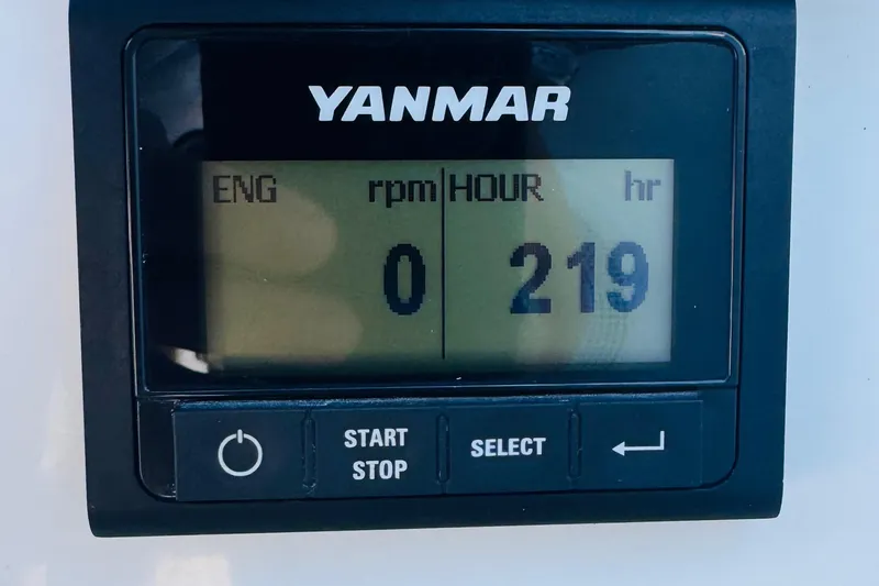 Slide: The Image of Yanmar engine display showing 219 hours on a 2023 Jeanneau 380. - 20