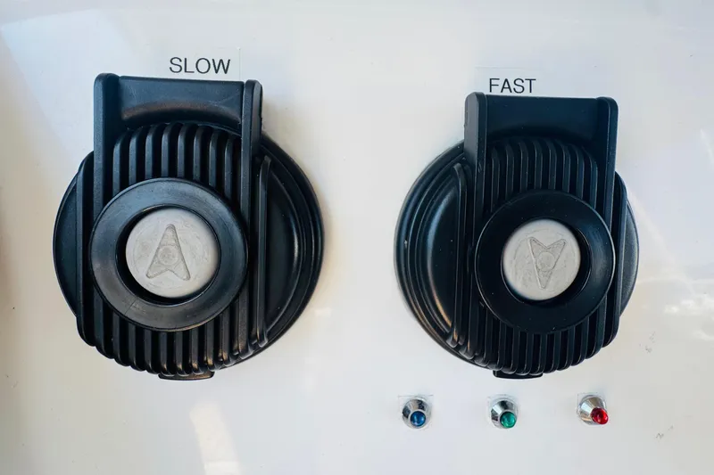 Slide: The Image of Control panel of a 2023 Jeanneau 380 with slow and fast settings. - 22