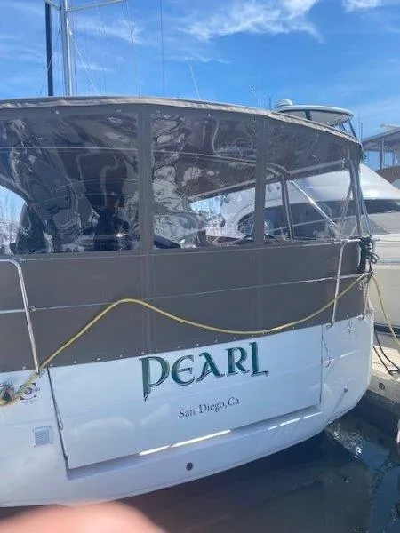 Slide: The Image of 2023 Jeanneau 380 yacht named "Pearl" docked in San Diego, California. - 28