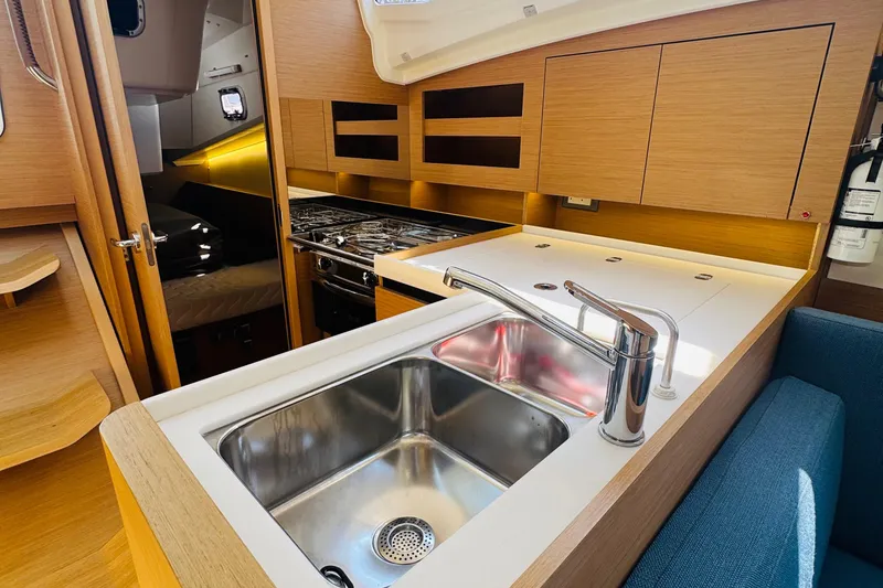 Slide: The Image of Modern kitchen interior of 2023 Jeanneau 380 yacht with sink and stove. - 47