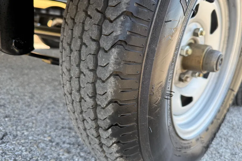 Slide: The Image of Close-up of a 2025 Flagship F22CU SPORT TOON tire on asphalt. - 10