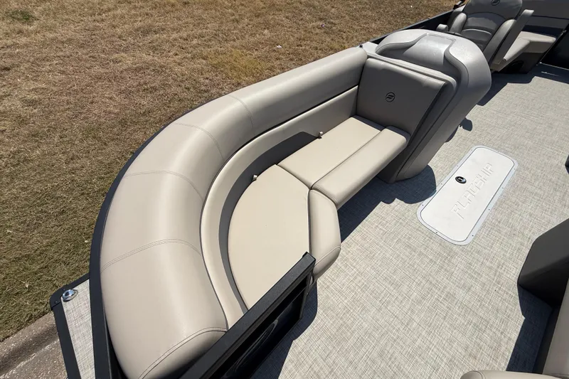 Slide: The Image of Luxurious seating on 2025 Flagship F22CU SPORT TOON boat, featuring elegant beige upholstery. - 25