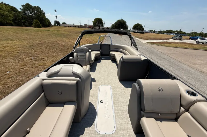 Slide: The Image of 2025 Flagship F22CU SPORT TOON pontoon boat with spacious seating and modern design. - 37