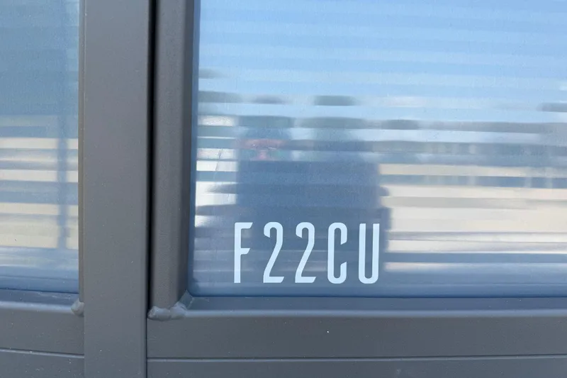 Slide: The Image of Close-up of Flagship F22CU SPORT TOON 2025 model window with reflection. - 4