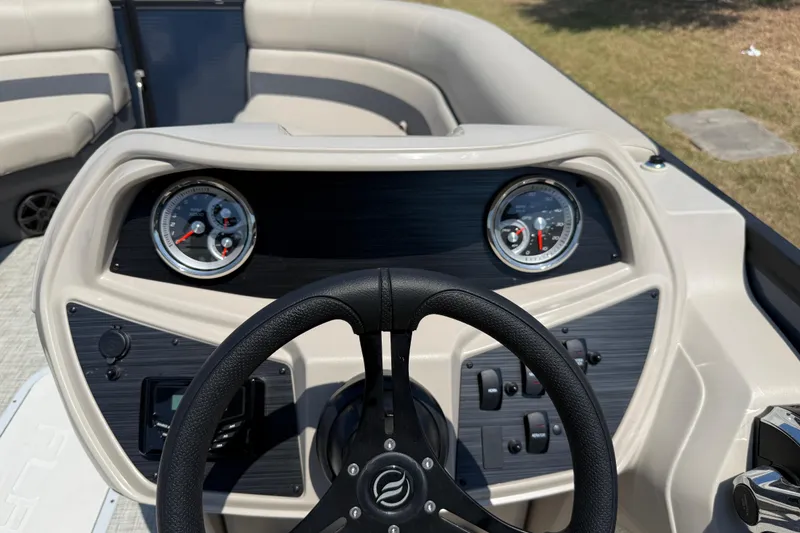 Slide: The Image of Steering console of 2025 Flagship F22CU SPORT TOON boat with gauges and controls. - 45