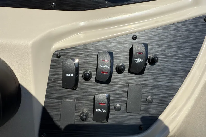 Slide: The Image of Control panel of 2025 Flagship F22CU SPORT TOON with switches for horn, power, and aerator. - 48