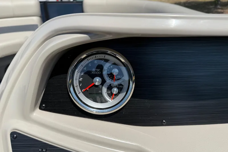 Slide: The Image of Dashboard of 2025 Flagship F22CU SPORT TOON with RPM and fuel gauges. - 50