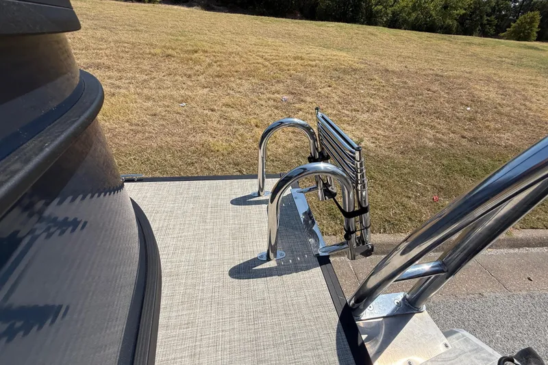 Slide: The Image of Pontoon boat deck with stainless steel ladder, Flagship F22CU SPORT TOON, 2025 model. - 63
