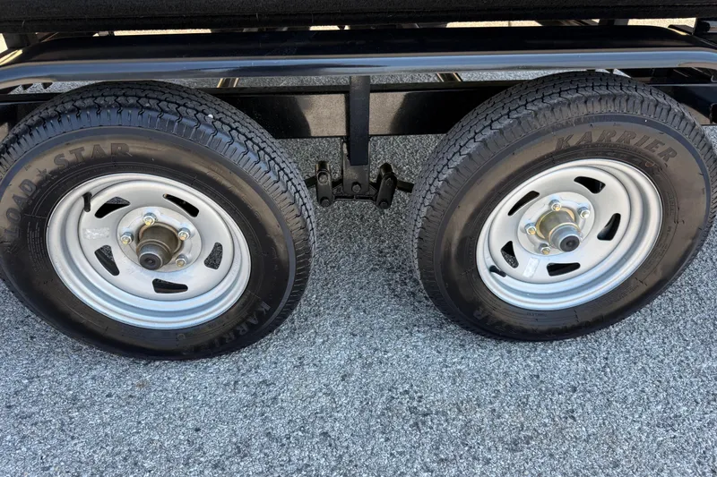 Slide: The Image of Dual wheels of 2025 Flagship F22CU SPORT TOON on asphalt surface. - 9