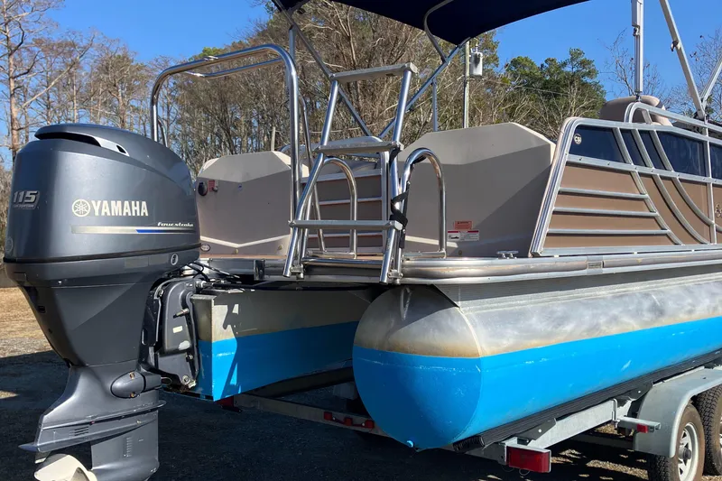 Slide: The Image of 2013 South Bay 724 pontoon boat with Yamaha 115 outboard motor on trailer. - 3