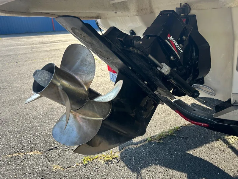 Slide: The Image of Close-up of a 2004 Sea Ray 225 Weekender boat propeller and Mercury outdrive. - 25