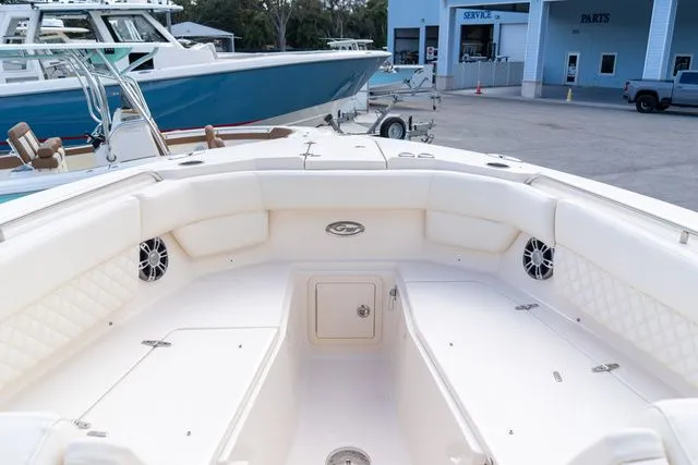 Slide: The Image of 2024 Grady-White Freedom 307 boat interior, featuring spacious seating and modern design. - 38