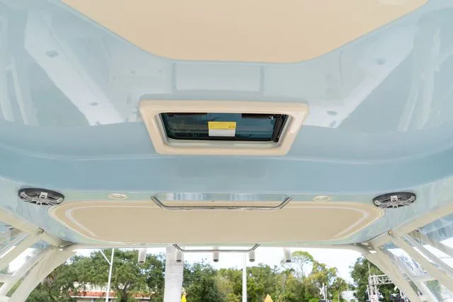 Slide: The Image of 2024 Grady-White Freedom 307 boat ceiling with hatch and lighting fixtures. - 49