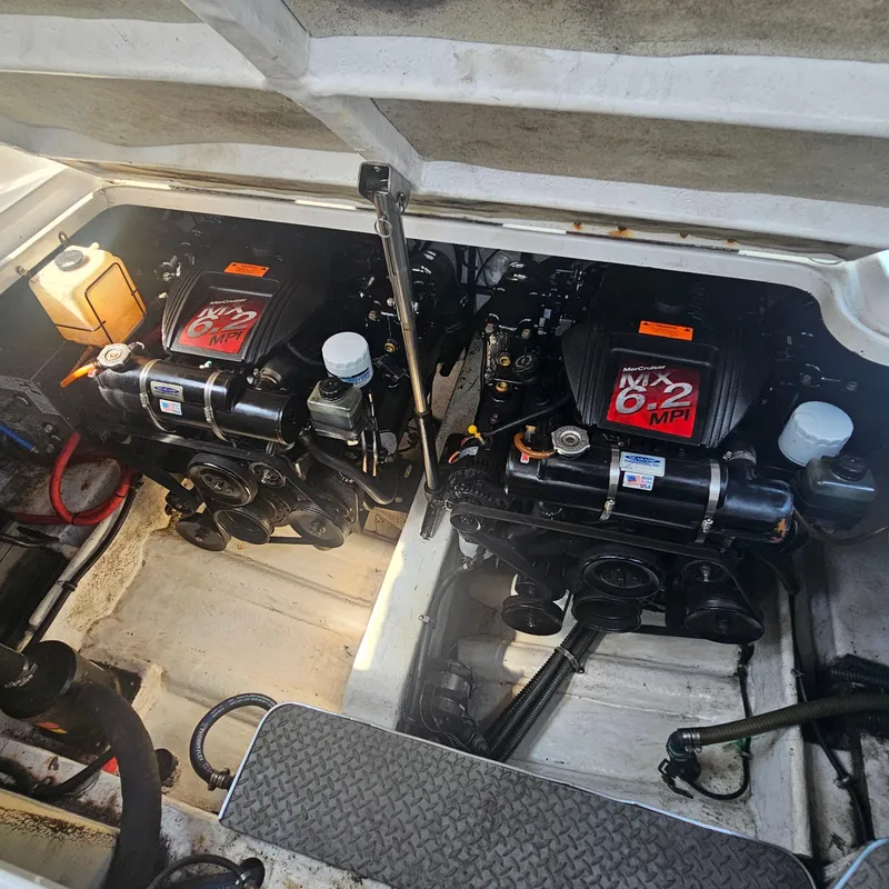 Slide: The Image of Twin MerCruiser engines in a 2000 Formula 31 PC boat engine compartment. - 26