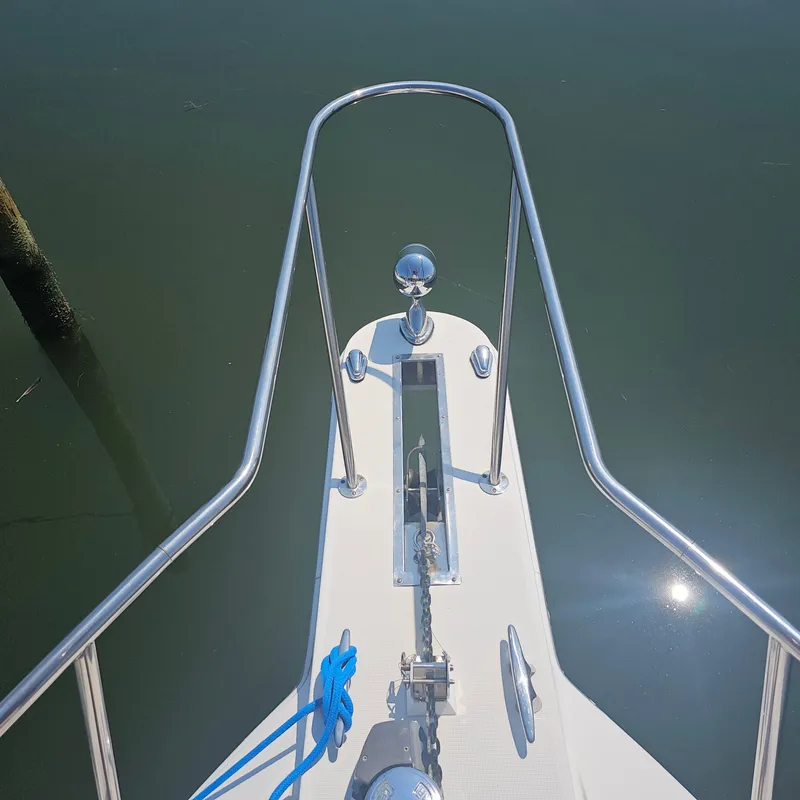 Slide: The Image of Bow of 2000 Formula 31 PC boat with anchor and railing. - 7