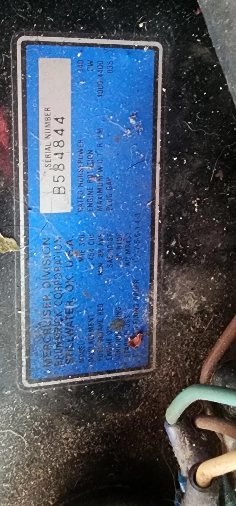 Slide: The Image of 1987 Sea Ray 36 Sundancer engine serial number plate with specifications. - 24