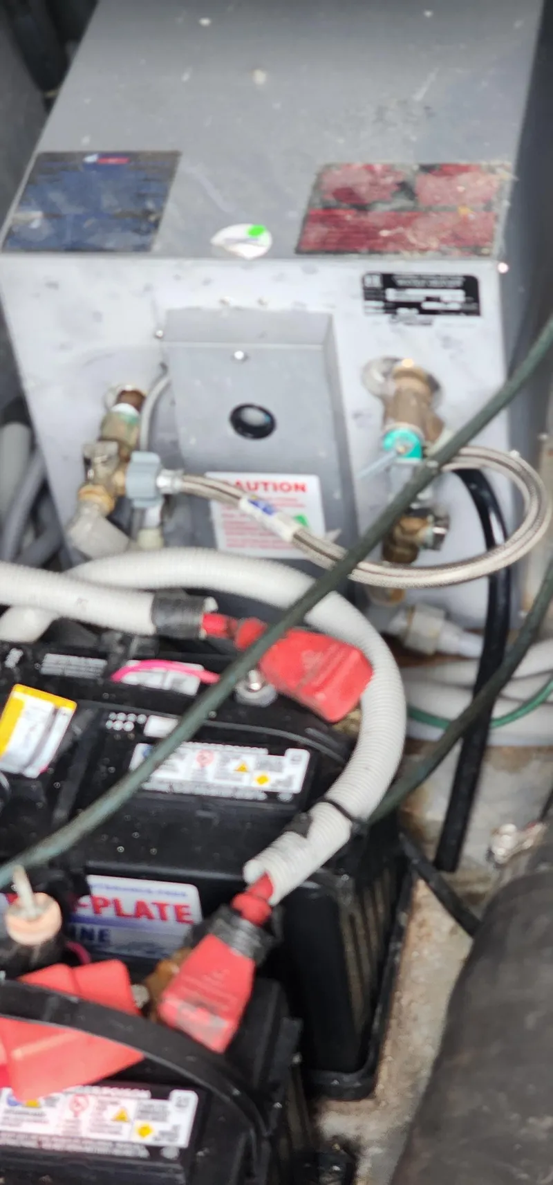 Slide: The Image of Engine compartment of 1987 Sea Ray 36 Sundancer with batteries and wiring. - 30