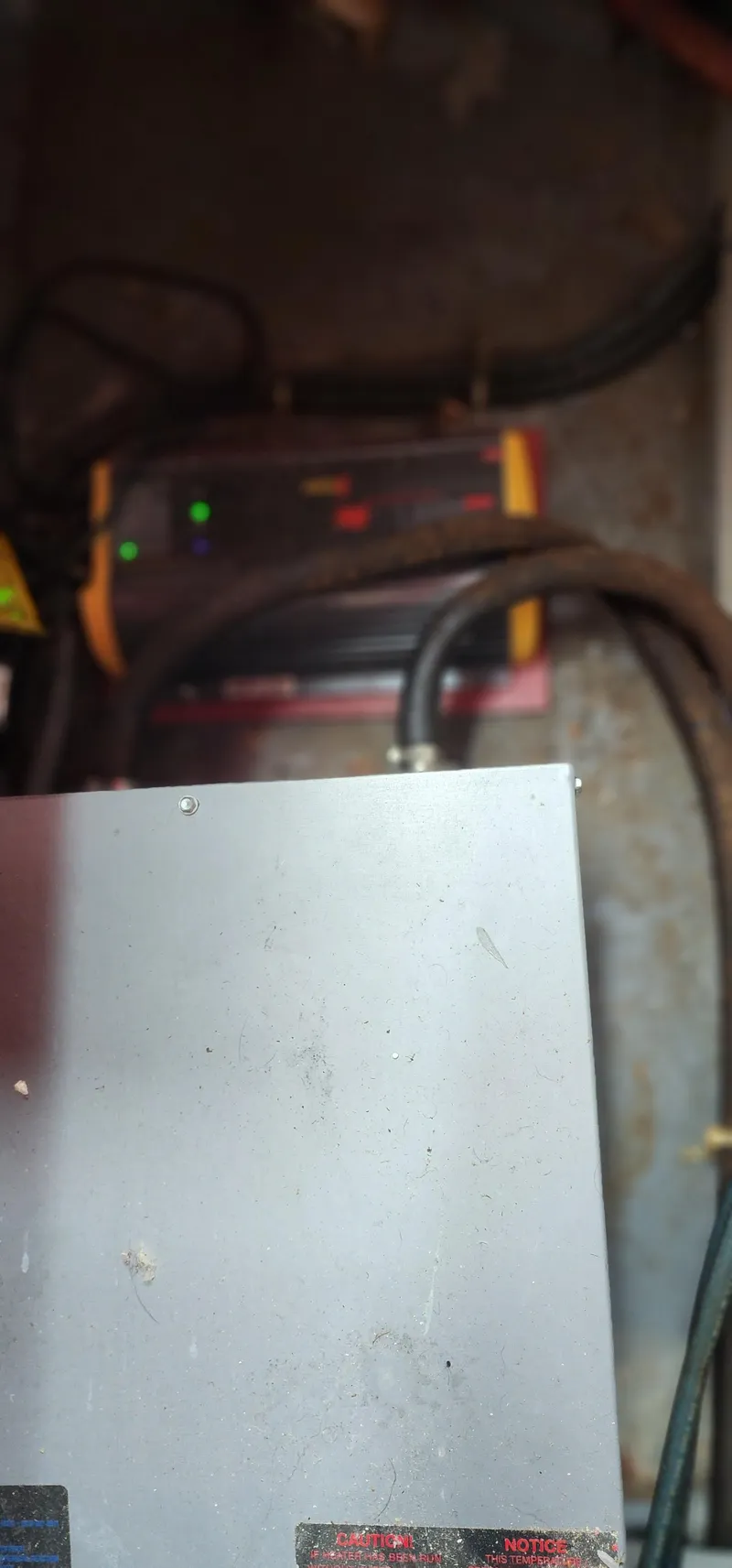 Slide: The Image of Electrical components inside a 1987 Sea Ray 36 Sundancer boat. - 33