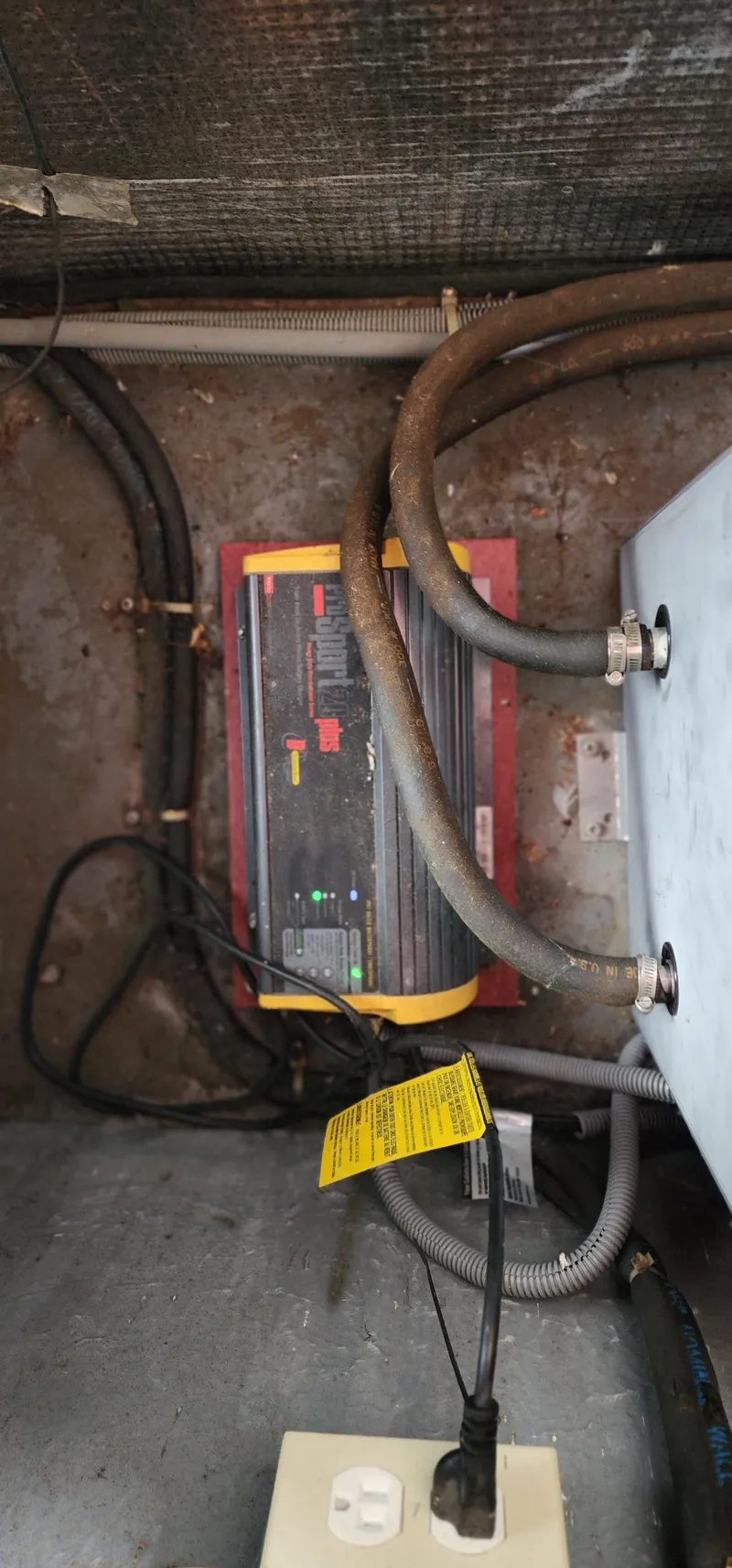 Slide: The Image of Battery charger setup in 1987 Sea Ray 36 Sundancer boat. - 35