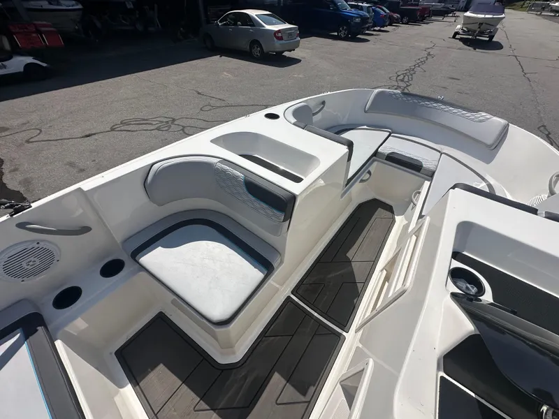 Slide: The Image of 2022 Bayliner Element M17 boat interior with seating and storage compartments. - 12
