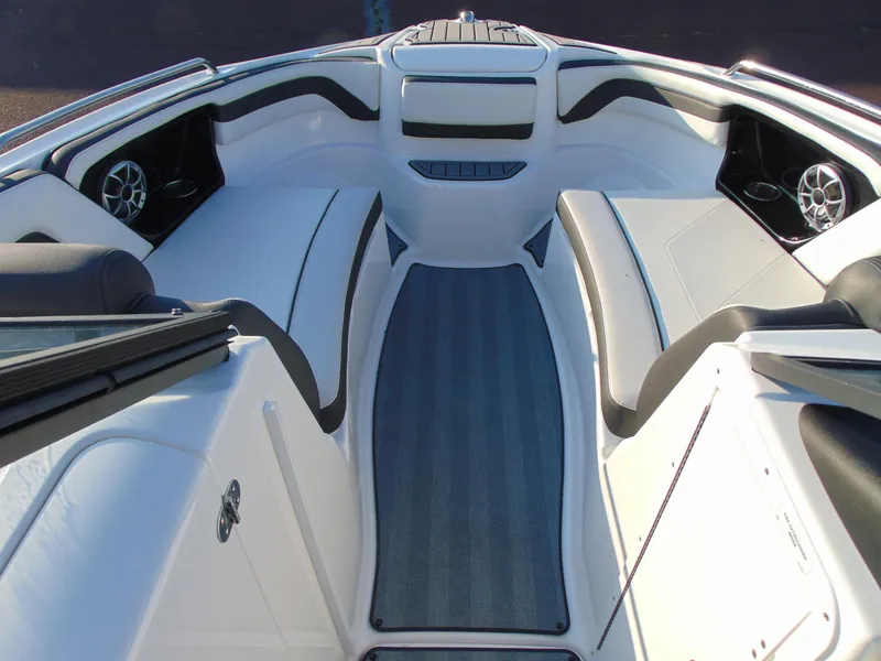 Slide: The Image of 2019 Yamaha Boats 242 Limited S E-Series interior with seating and speakers. - 10