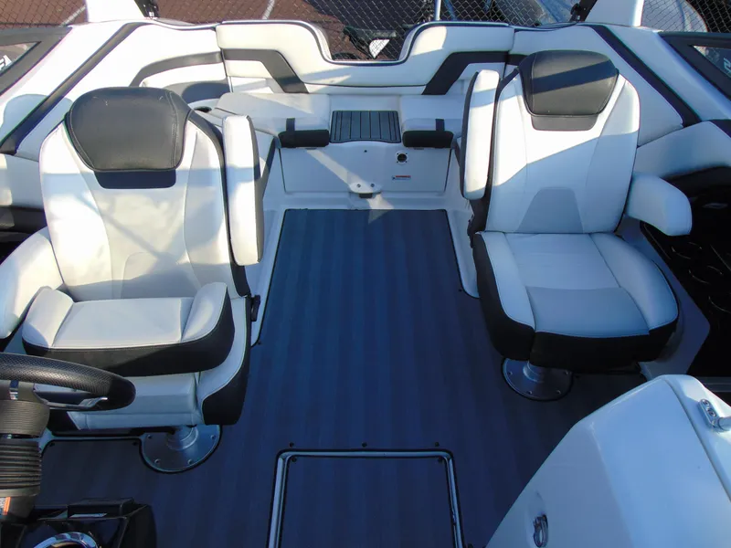 Slide: The Image of 2019 Yamaha Boats 242 Limited S E-Series interior with white and black seating. - 11