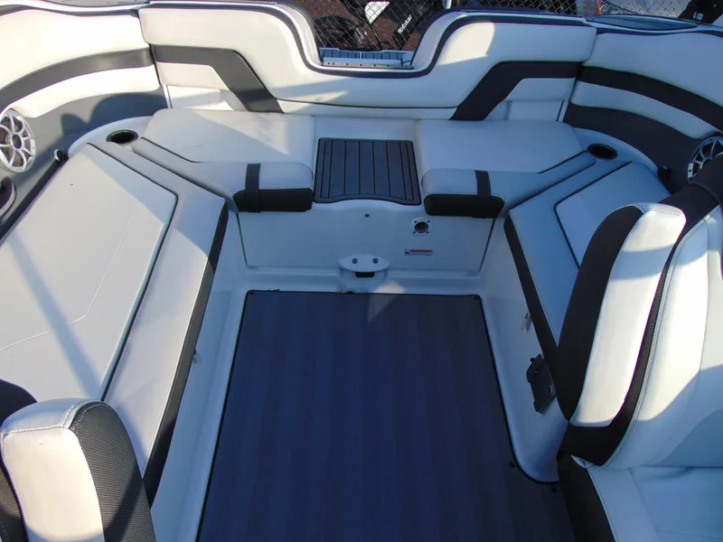 Slide: The Image of 2019 Yamaha Boats 242 Limited S E-Series interior with spacious seating and modern design. - 14