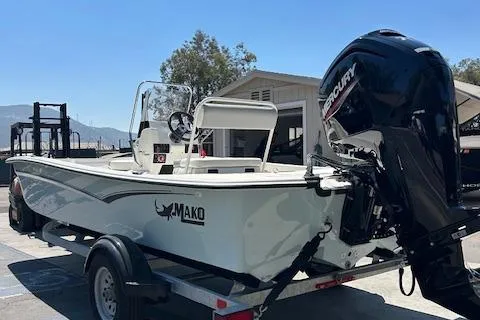 Slide: The Image of 2025 Mako Pro Skiff 17 CC boat with Mercury 75 engine on trailer. - 3