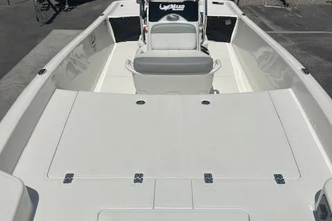 Slide: The Image of 2025 Mako Pro Skiff 17 CC boat on trailer, parked outdoors. - 6