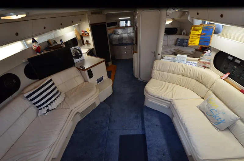 Slide: The Image of Interior of 1989 Carver SANTEGO yacht with plush seating and nautical decor. - 26