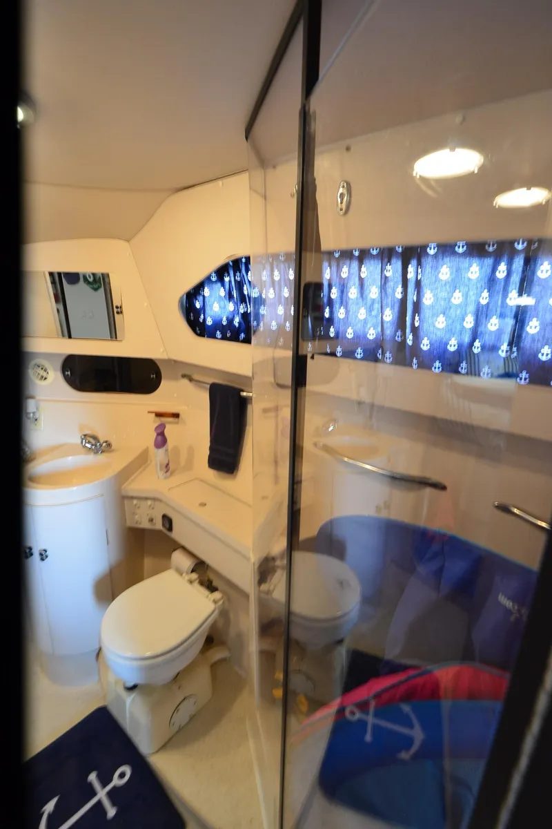 Slide: The Image of 1989 Carver SANTEGO yacht bathroom with nautical decor and modern amenities. - 31