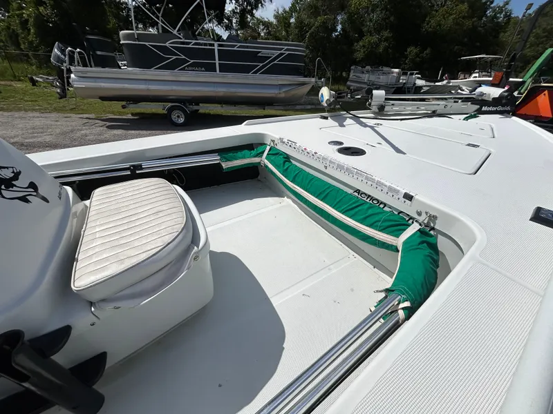 Slide: The Image of 1998 Action Craft 1820 Special Edition boat interior with seating and storage compartments. - 7