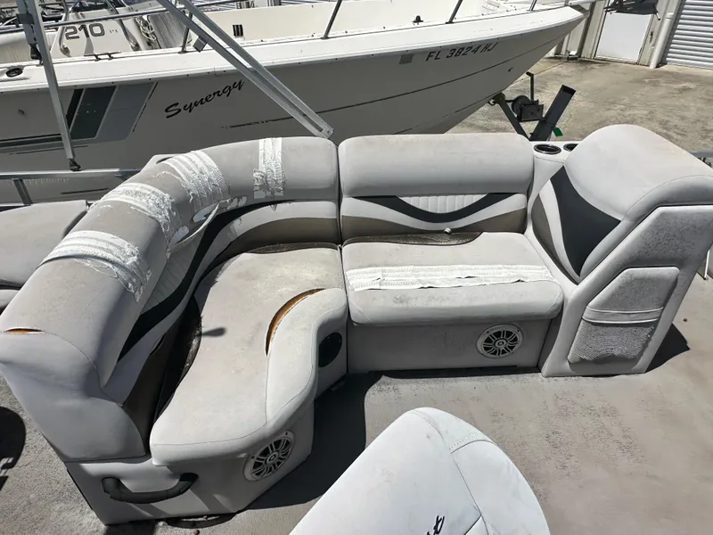 Slide: The Image of Worn seating on 2016 Qwest LS 820 Cruise boat, showing visible damage and wear. - 14
