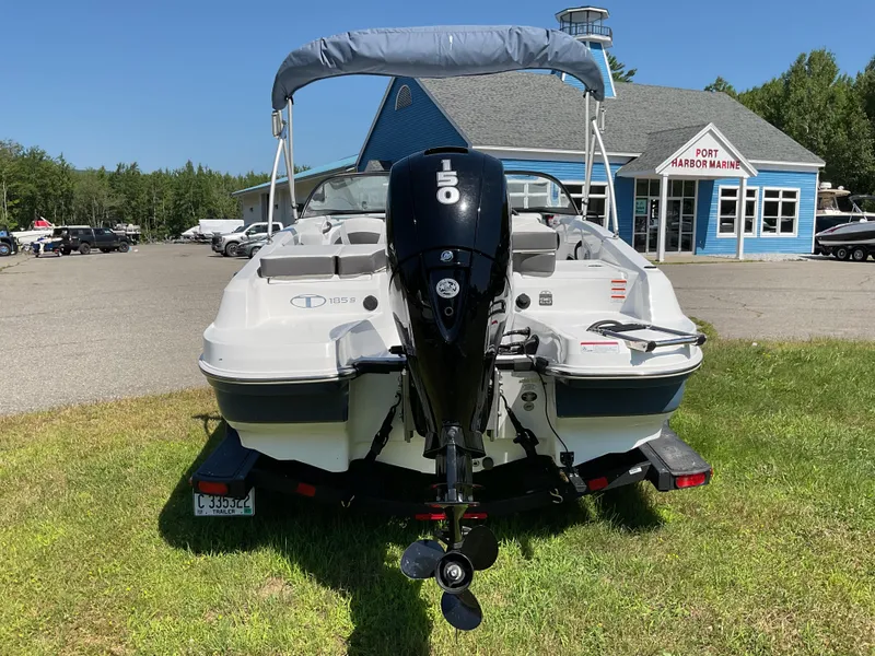 Slide: The Image of 2023 Tahoe 185 S boat at Port Harbor Marine, rear view with outboard motor. - 5