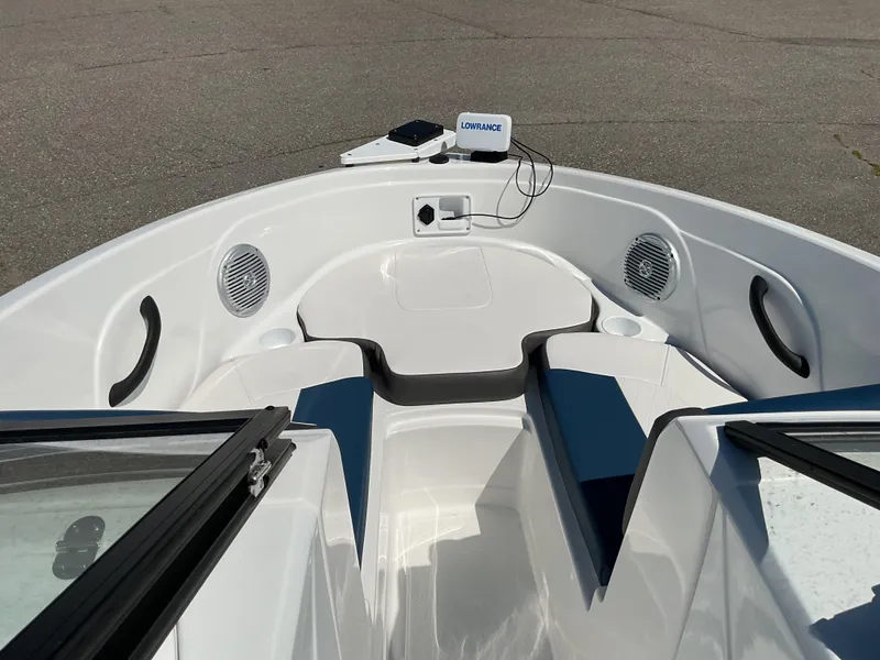 Slide: The Image of 2023 Tahoe 185 S boat interior with seating, speakers, and navigation equipment. - 9