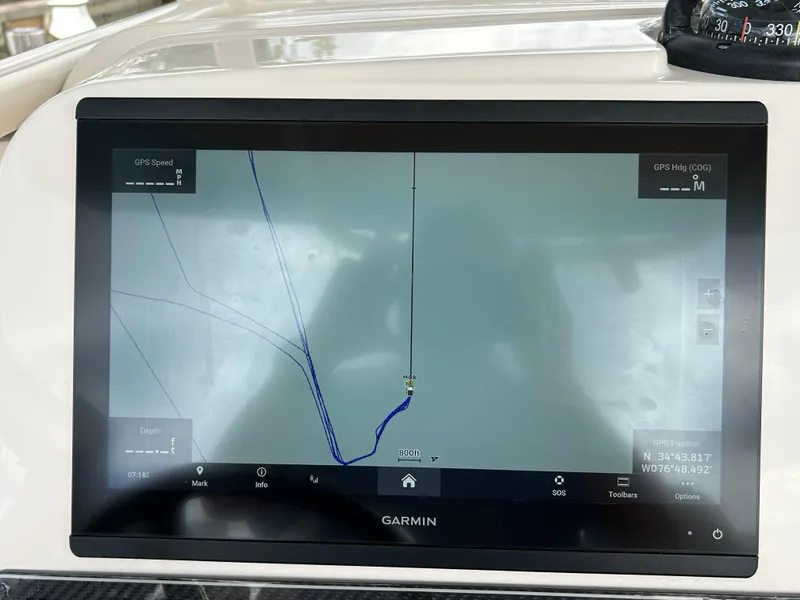 Slide: The Image of Garmin navigation display on 2023 Grady-White 281 Coastal Explorer boat. - 11