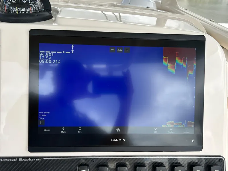 Slide: The Image of Garmin marine display on 2023 Grady-White 281 Coastal Explorer boat dashboard. - 12