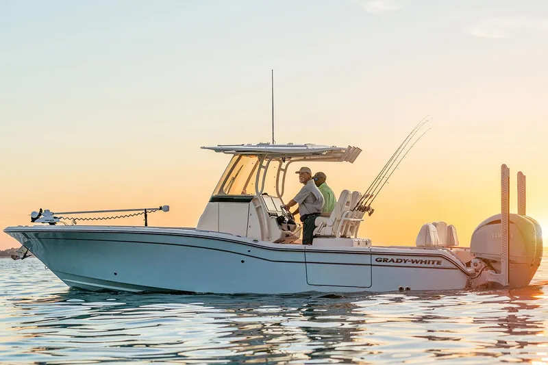 Slide: The Image of Manufacturer Provided Image: 2023 Grady-White 281 Coastal Explorer boat on water at sunset. - 20