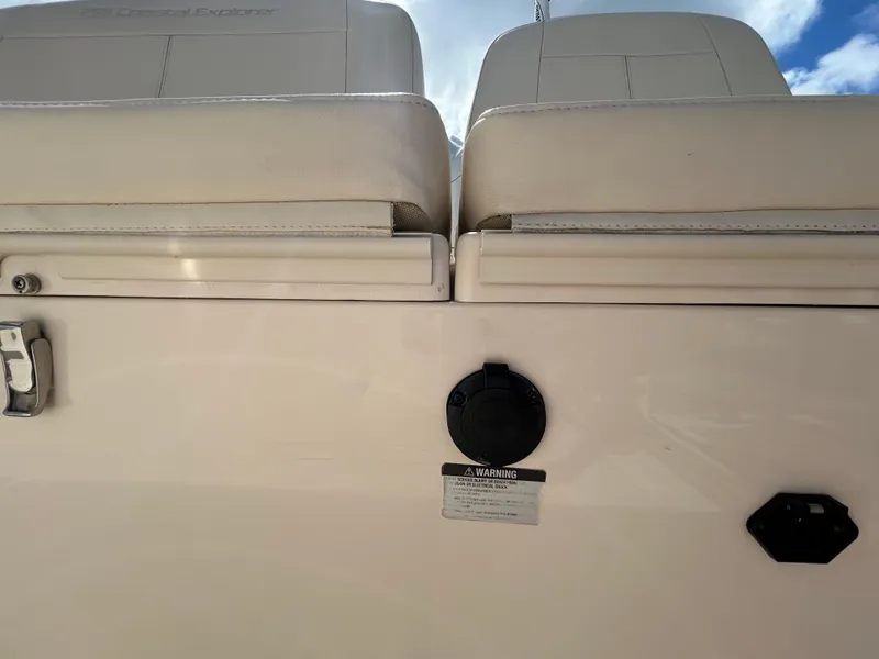 Slide: The Image of 2023 Grady-White 281 Coastal Explorer boat seating and storage compartment detail. - 5