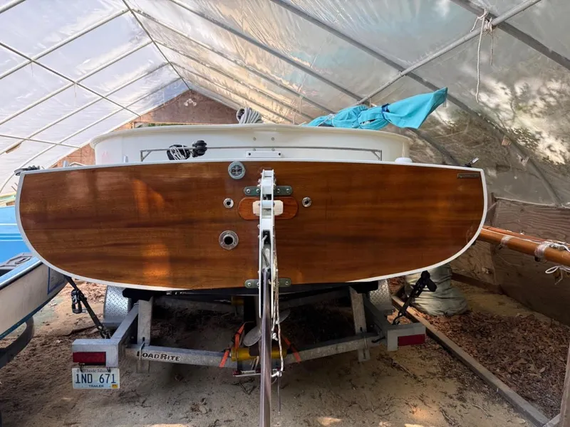 Slide: The Image of Custom AREY's XFC-22 boat, 2022 model, on trailer in covered storage. - 20