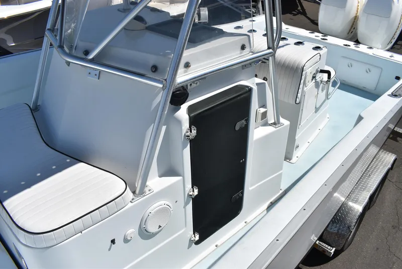 Slide: The Image of 2006 Cape Horn 27 CC boat interior with seating and console, showcasing sleek design and functionality. - 12