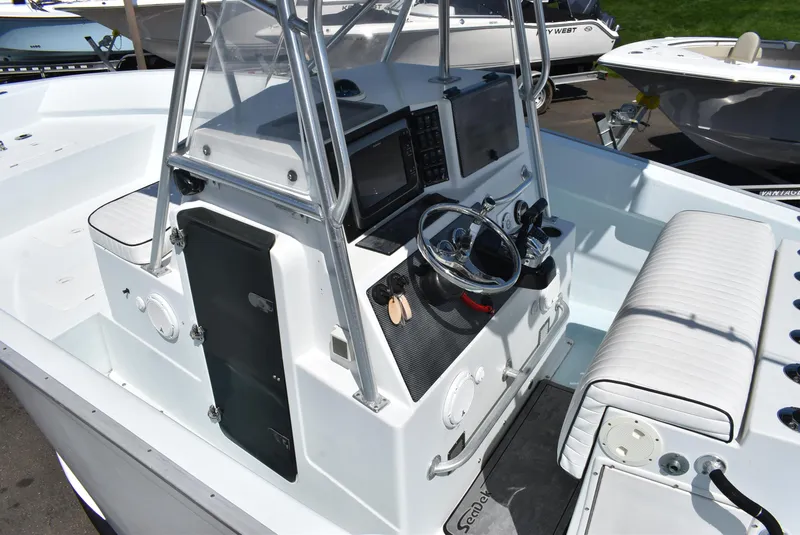 Slide: The Image of 2006 Cape Horn 27 CC boat cockpit with steering wheel and seating. - 13