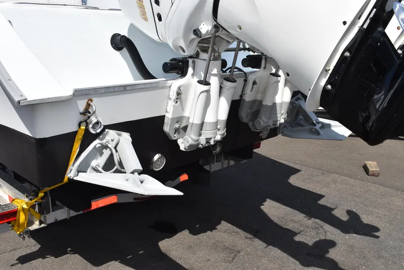 Slide: The Image of 2006 Cape Horn 27 CC boat with dual outboard motors on a trailer. - 19