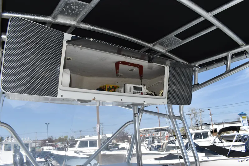 Slide: The Image of 2006 Cape Horn 27 CC boat console with storage compartment and electronic equipment. - 20
