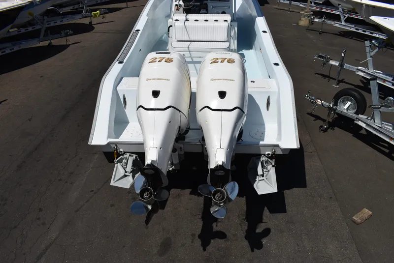 Slide: The Image of 2006 Cape Horn 27 CC boat with twin outboard engines on a trailer. - 4