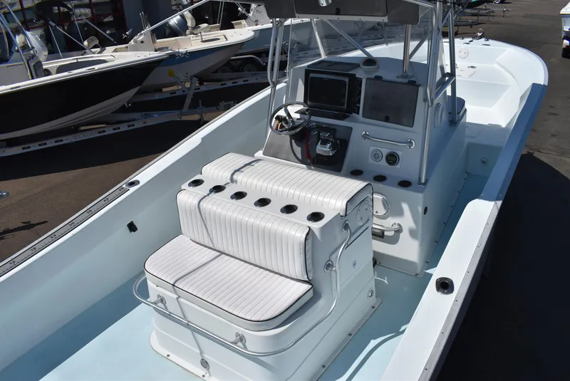 Slide: The Image of 2006 Cape Horn 27 CC boat interior with helm, seating, and controls. - 7